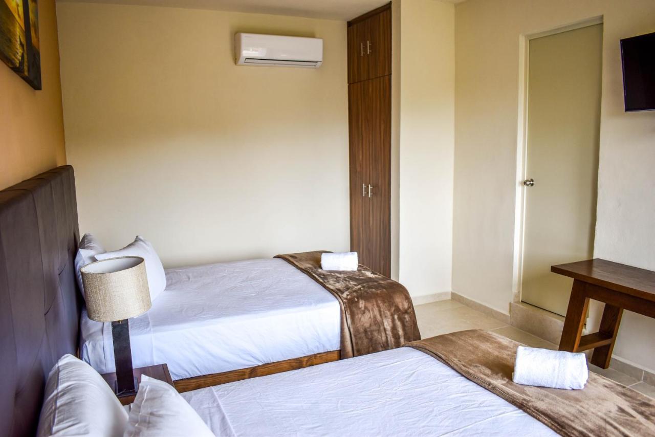 Hotel Muchin プエルト・モレロス エクステリア 写真